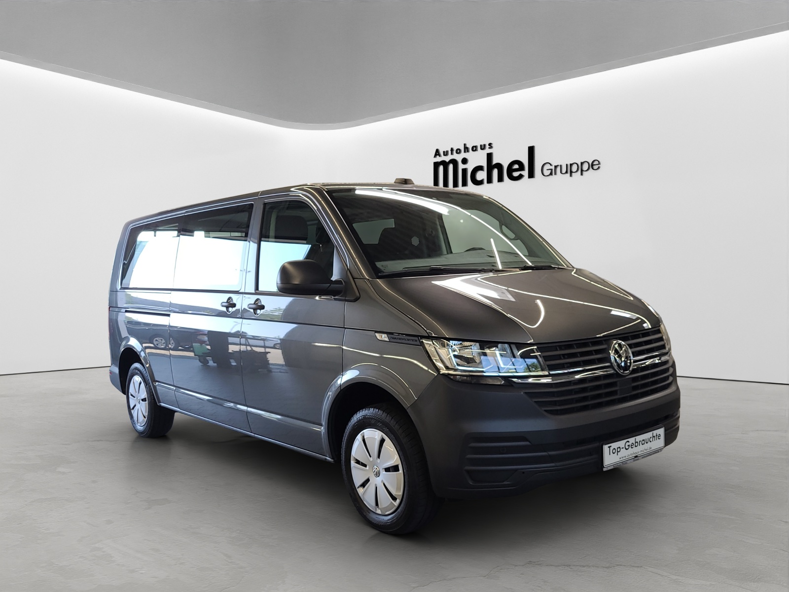 T6 Transporter Kombi 6.1 TDI DSG LR 9 Sitzer Navi Doppelklima PDC Kamera